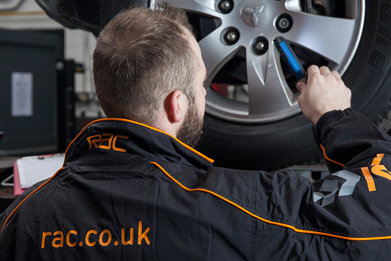 RAC Technician working on a car